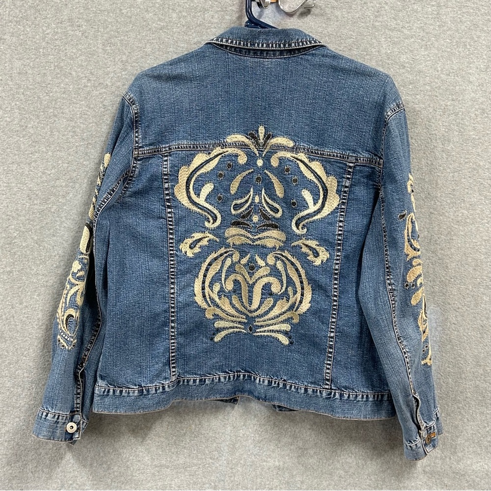 Chico’s brand Jean Jacket with embroidered design on arms and back.